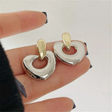 Irregular Double-Color Stud Earrings with a Vintage Metal Twist for Women.