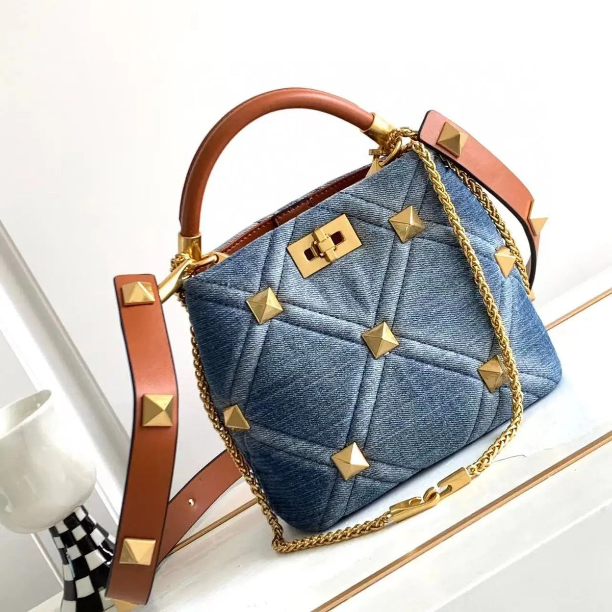 Luxe Denim Rivet Handbag  .