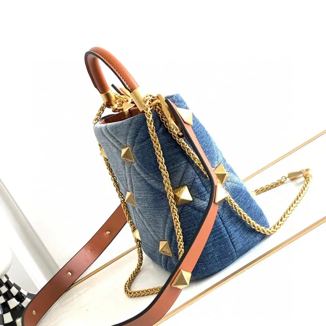 Luxe Denim Rivet Handbag  .