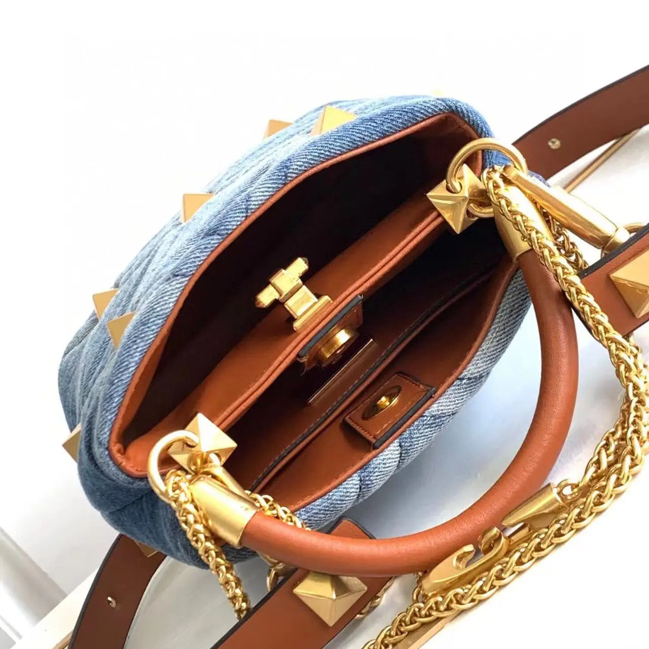 Luxe Denim Rivet Handbag  .